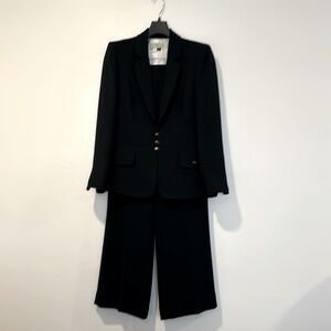 Sleek Tahari ASL Suit
- Beautiful buttons
- Shoulder Pads
- Navy